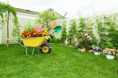 Landscaping workers and tools representing ethical site operations